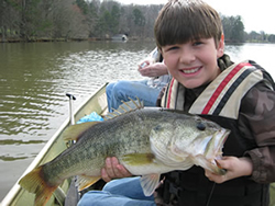 Boy holding a Largemouth Bass