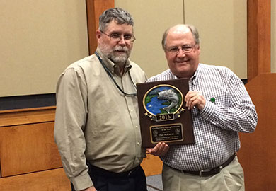 Paul McKee (right) receives the award as Certified SCDNR Fishing Instructor of the Year from Ross Self, SCDNR chief of freshwater fisheries.