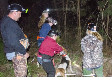 Youth hunters prepare to release their hounds at the 2017 South Carolina State Youth Raccoon Hunting Championship. No raccoons are killed during these competitions.  Instead, points are awarded by judges based upon the order that the contestants interpret their dogs barks to identify when the dogs strike a raccoons trail and when their dogs have treed a raccoon.   SCDNR photo by David Lucas