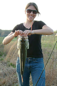 Girl holding a Large Mouth Bass