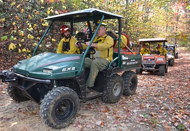 Firefighters from the S.C. Forestry Commission and other organizations head to Pinnacle Mountain in northern Pickens County on Wednesday, Nov. 9 to battle a wildfire near Drawbar Cliffs. The S.C. Department of Natural Resources has issued a burning ban on Jocassee Gorges lands due to dry conditions and the dangers of wildfire. (SCDNR Photo by Greg Lucas)