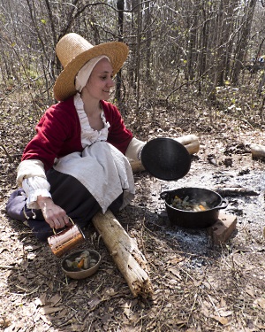Archaeologist Nicole Isenbarger demonstrates Colonial era cooking techniques at the 2014 Kolb Public Day