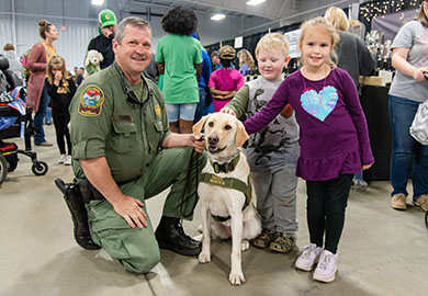 Everyone loves to come to the Palmetto Sportsmen’s Classic in Columbia – even members of the SCDNR’s K-9 team. [SCDNR photo by Dan Dupre]