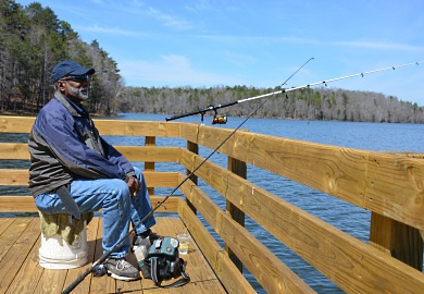 Michael Tinsley of Spartanburg was the first angler to fish off the new barrier-free fishing pier at Lake Craig after the official ribbon cutting. (SCDNR photos by Greg Lucas)