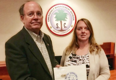 Maria Cox Lamm presented with the South Carolina State Commendation Ribbon.