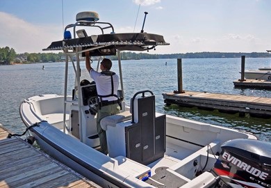 SCDNR Lance Cpl. Jason Smith secures his boat to the dock at Lake Murray.