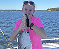a girl holding a Blue Catfish