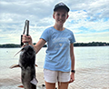 a girl holding a Blue Catfish